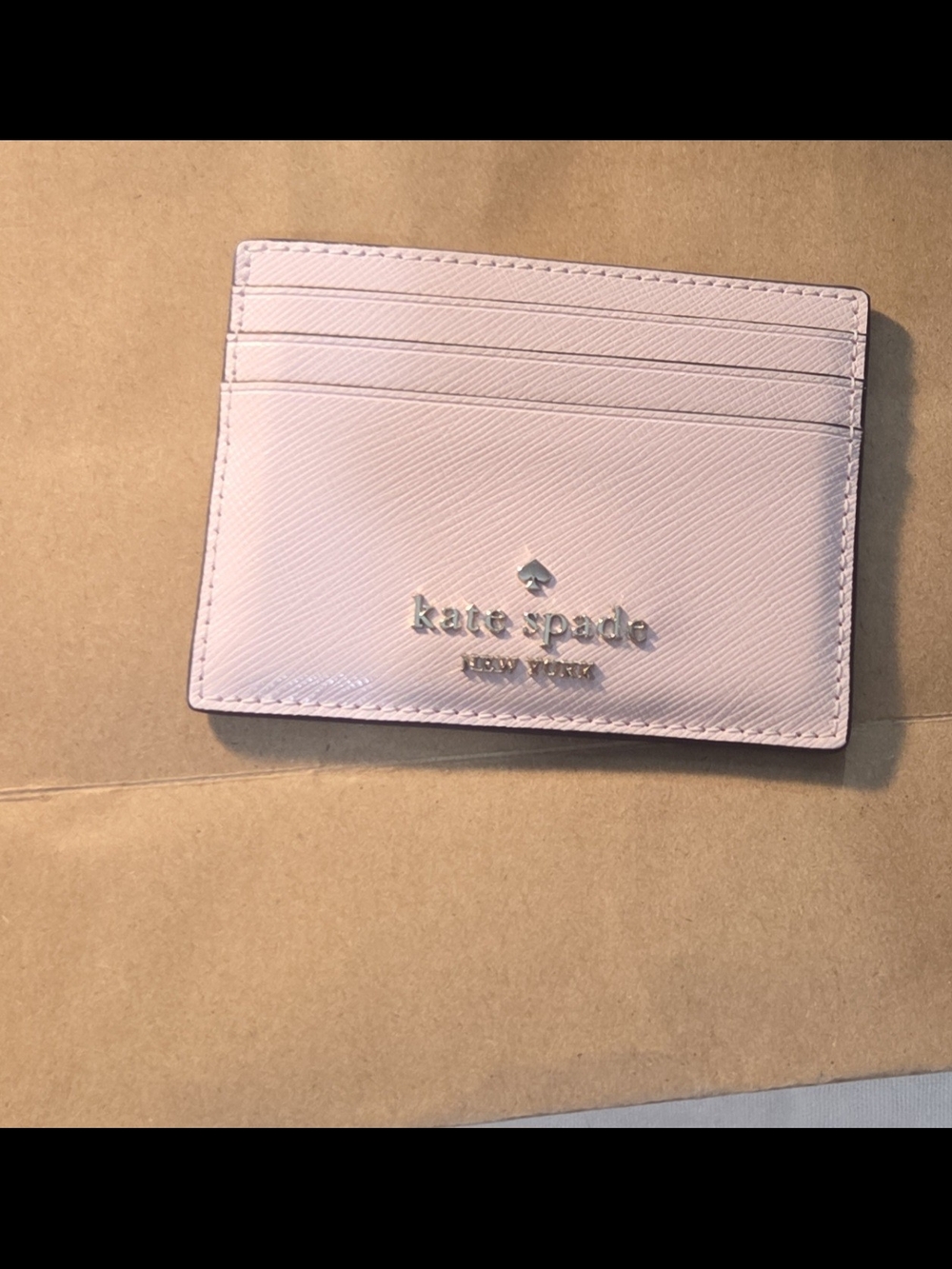 kate spade pale pink textured card holder